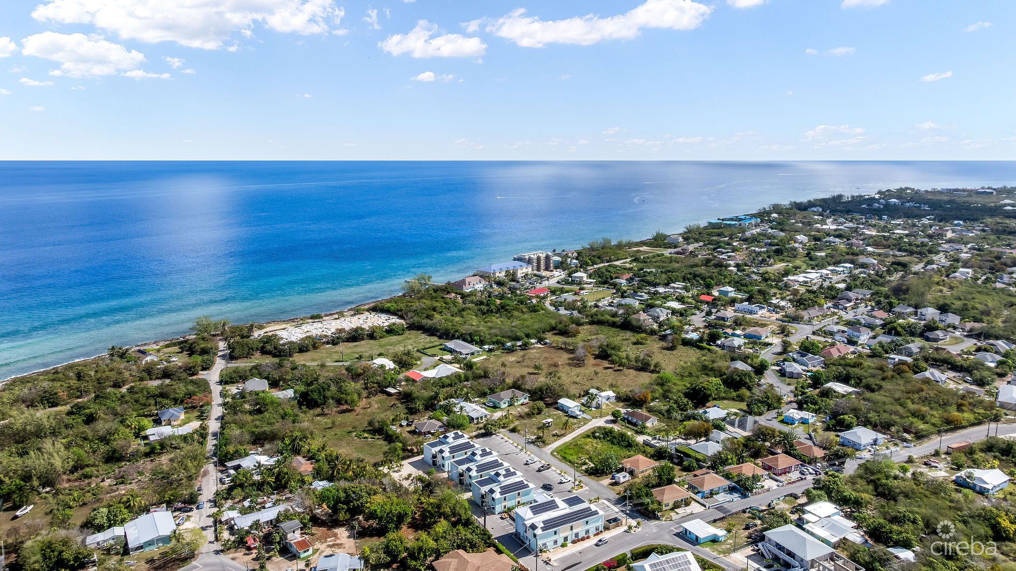 INCOME-PRODUCING RESIDENTIAL PORTFOLIO –4 STUDIOS IN WEST BAY