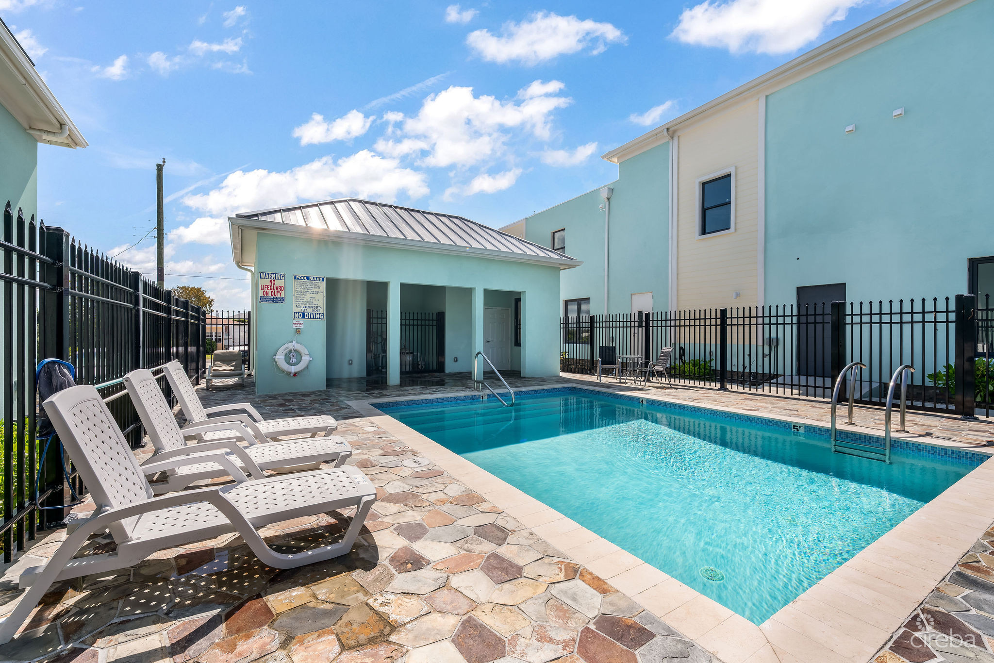 INCOME-PRODUCING RESIDENTIAL PORTFOLIO –4 STUDIOS IN WEST BAY