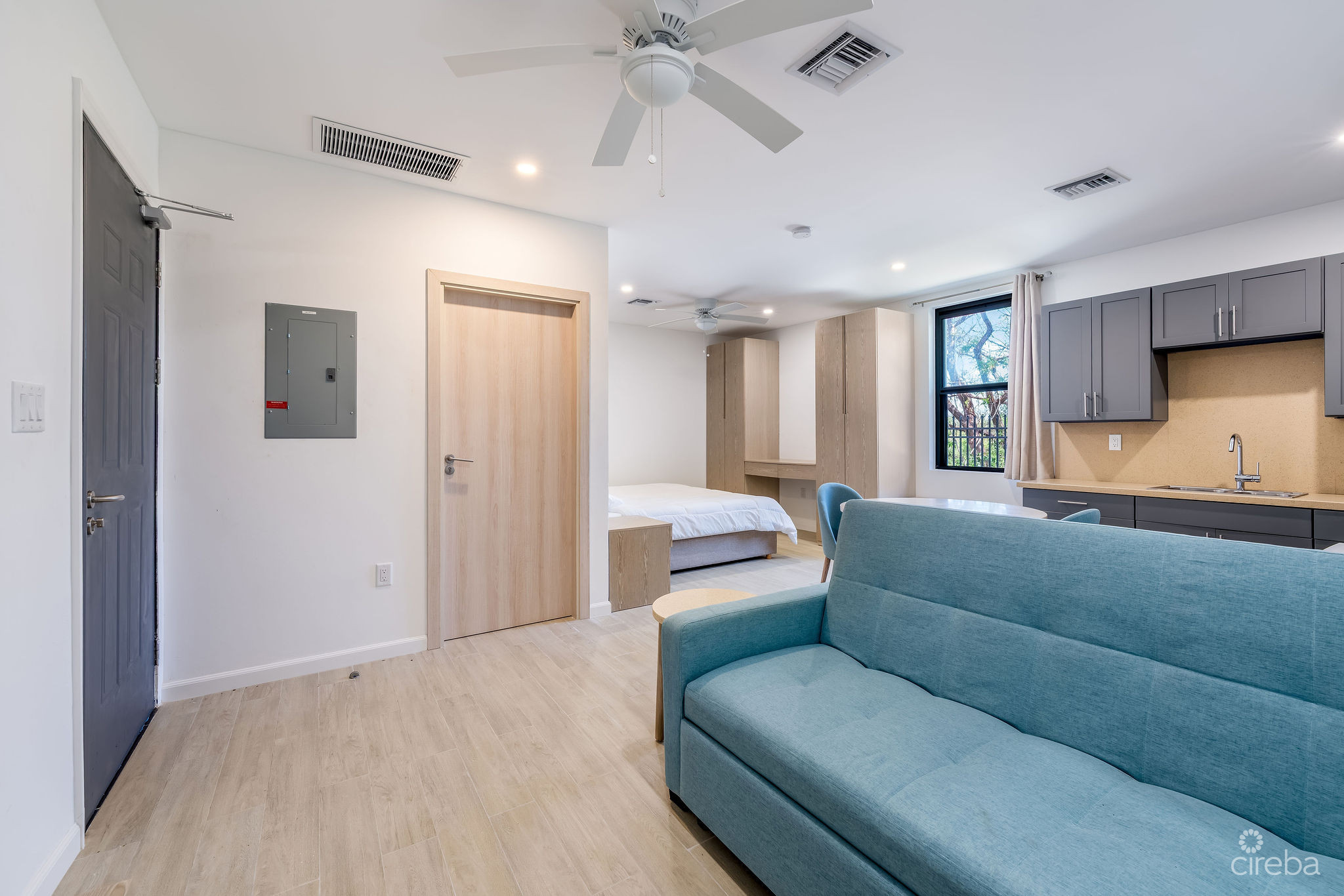 INCOME-PRODUCING RESIDENTIAL PORTFOLIO –4 STUDIOS IN WEST BAY