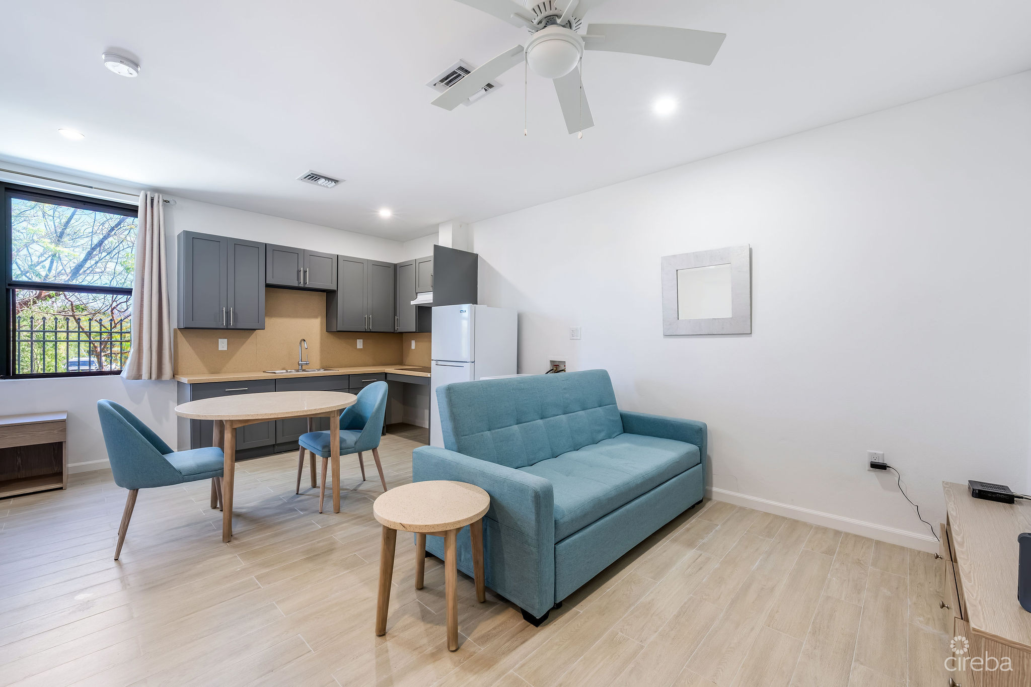 INCOME-PRODUCING RESIDENTIAL PORTFOLIO –4 STUDIOS IN WEST BAY