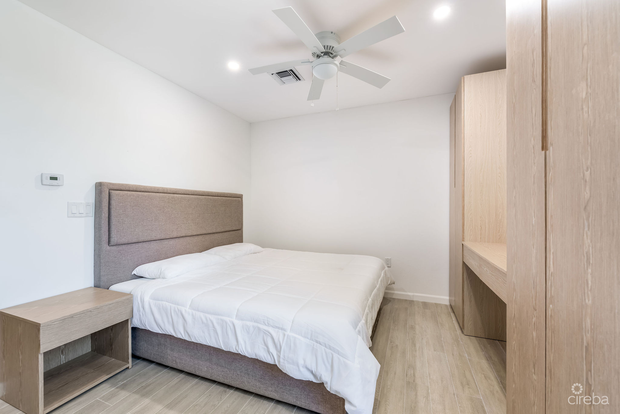 INCOME-PRODUCING RESIDENTIAL PORTFOLIO –4 STUDIOS IN WEST BAY