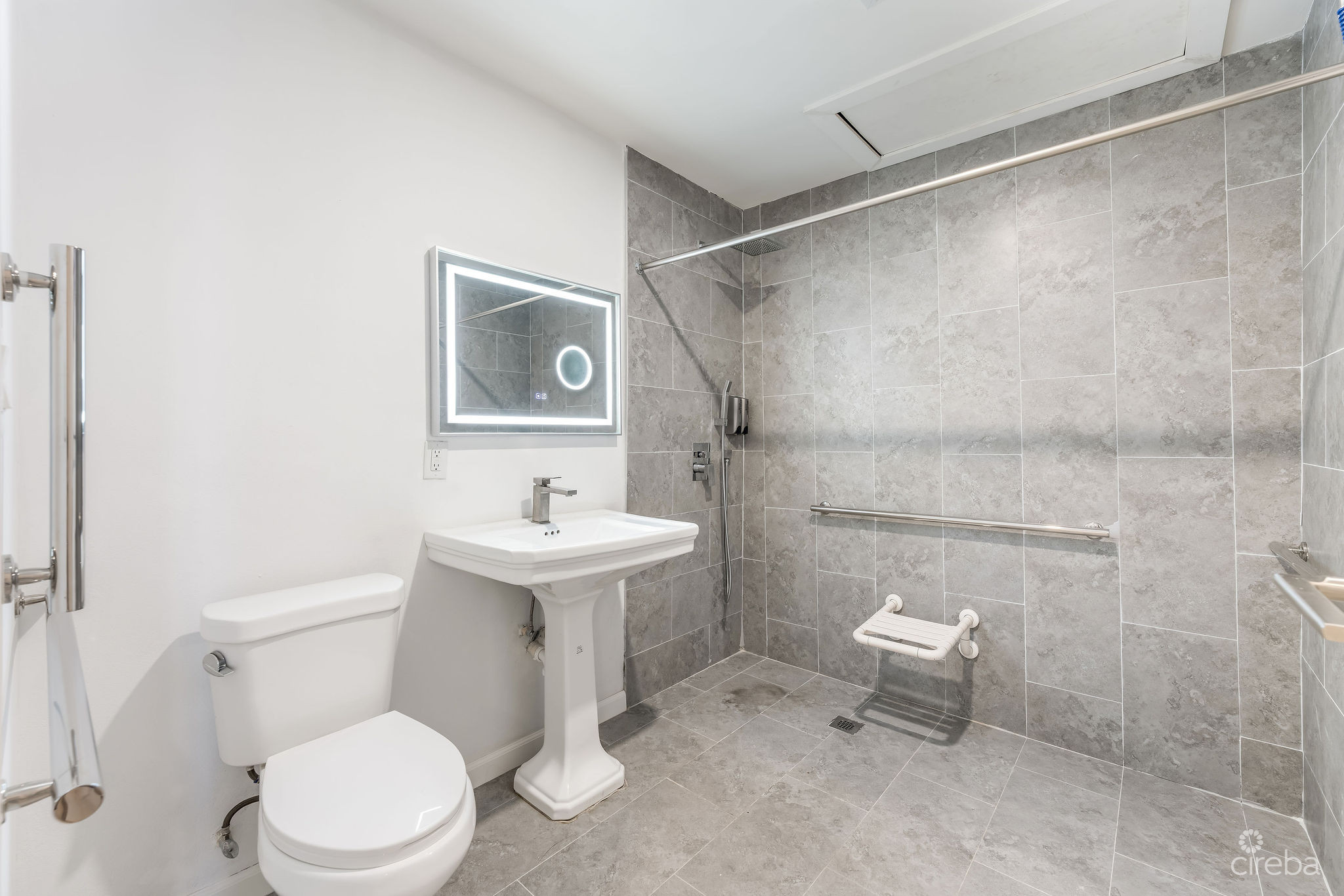 INCOME-PRODUCING RESIDENTIAL PORTFOLIO –4 STUDIOS IN WEST BAY