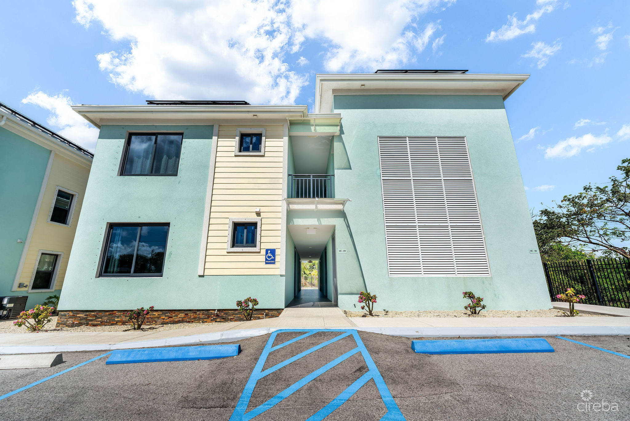 INCOME-PRODUCING RESIDENTIAL PORTFOLIO –4 STUDIOS IN WEST BAY