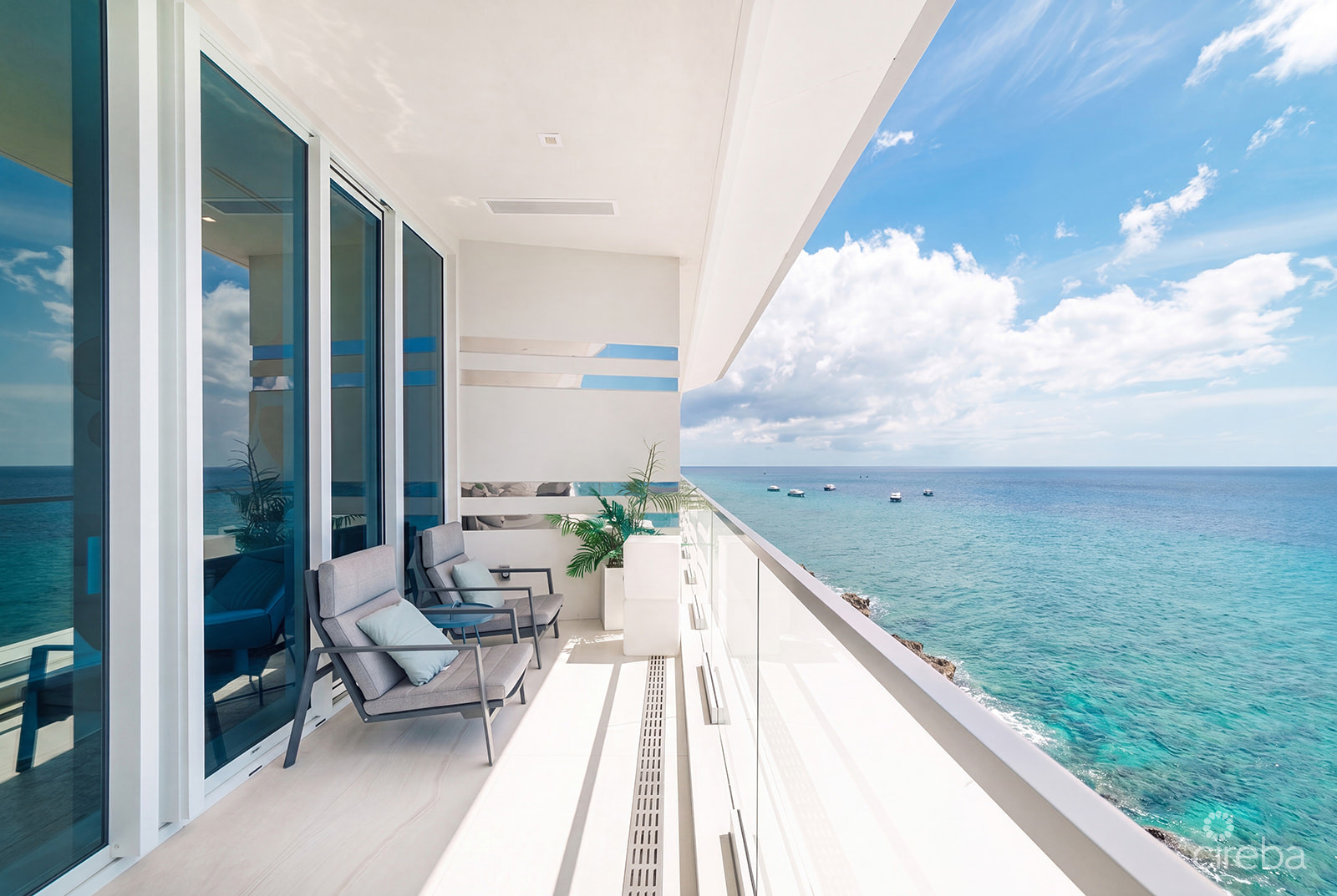 THREE-LEVEL OCEANFRONT FIN PENTHOUSE #30 PLUS 2 GARAGES