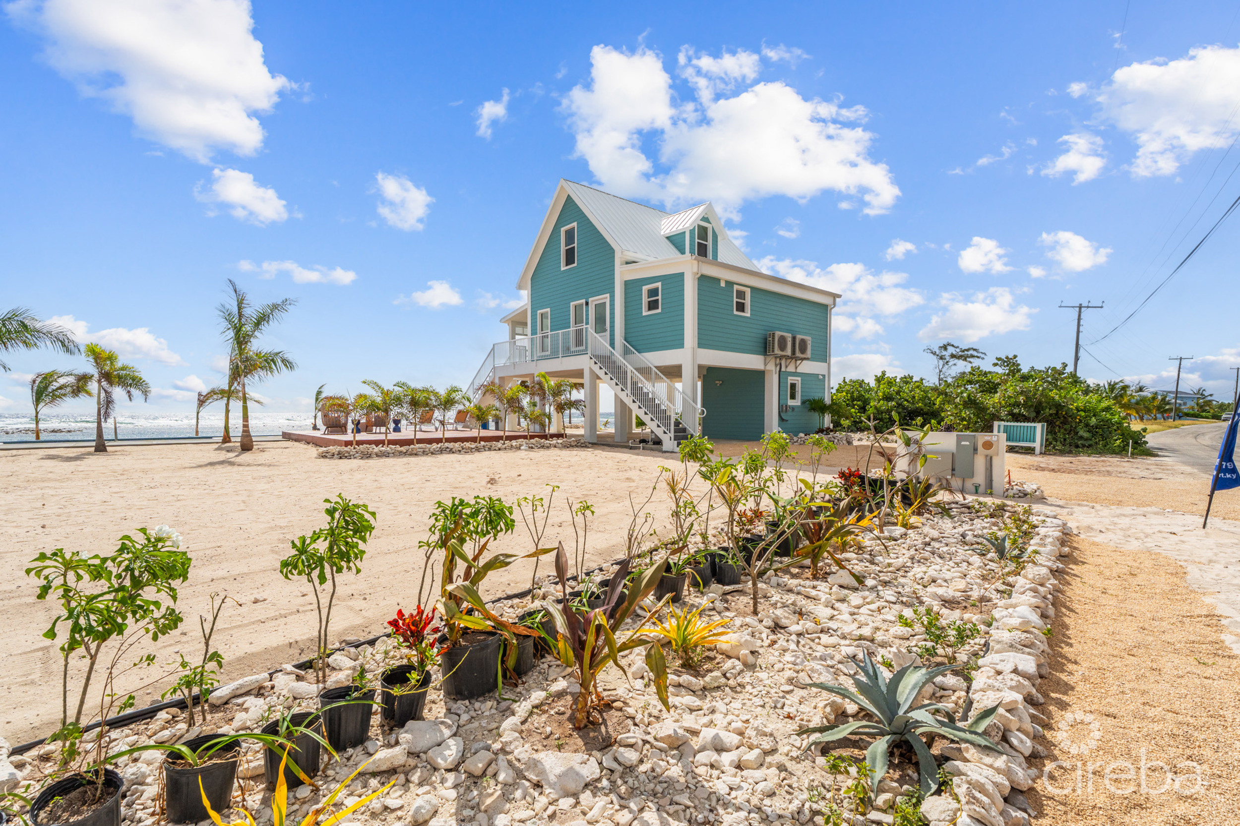 THE PALMS, LITTLE CAYMAN | TWO BEACHFRONT COTTAGES