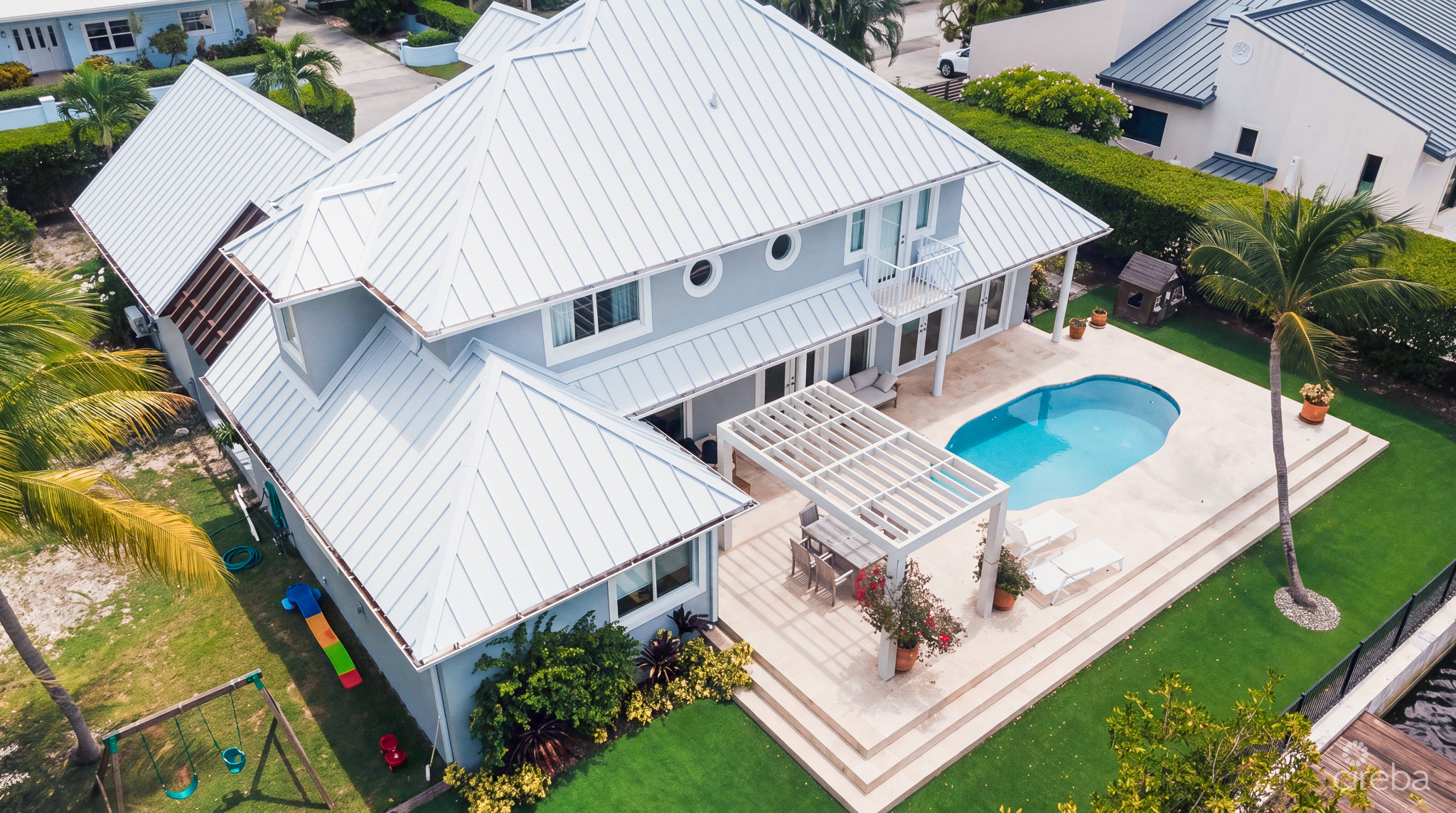 GOVERNORS HARBOUR – 266 RALEIGH HARBOUR NORTH EXECUTIVE CANAL-FRONT HOME