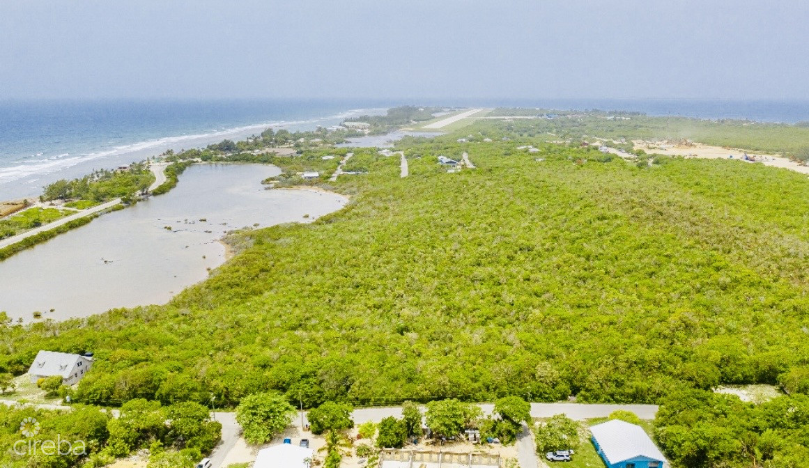ALEXANDER GROVE SUBDIVISION - CAYMAN BRAC - POND LOT 4 5