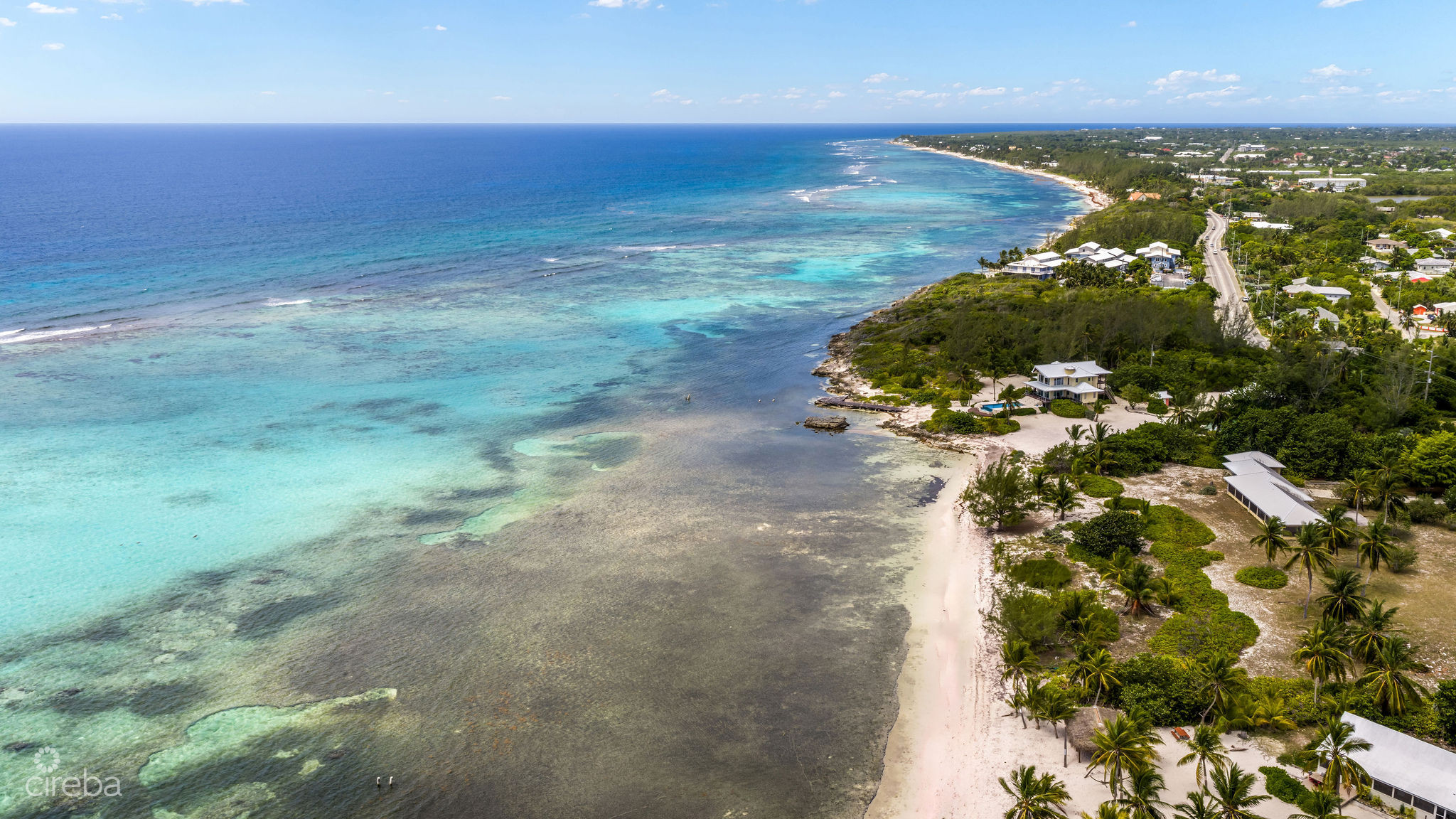 BODDEN TOWN HOTEL/TOURISM BEACHFRONT ACREAGE & COTTAGE 3