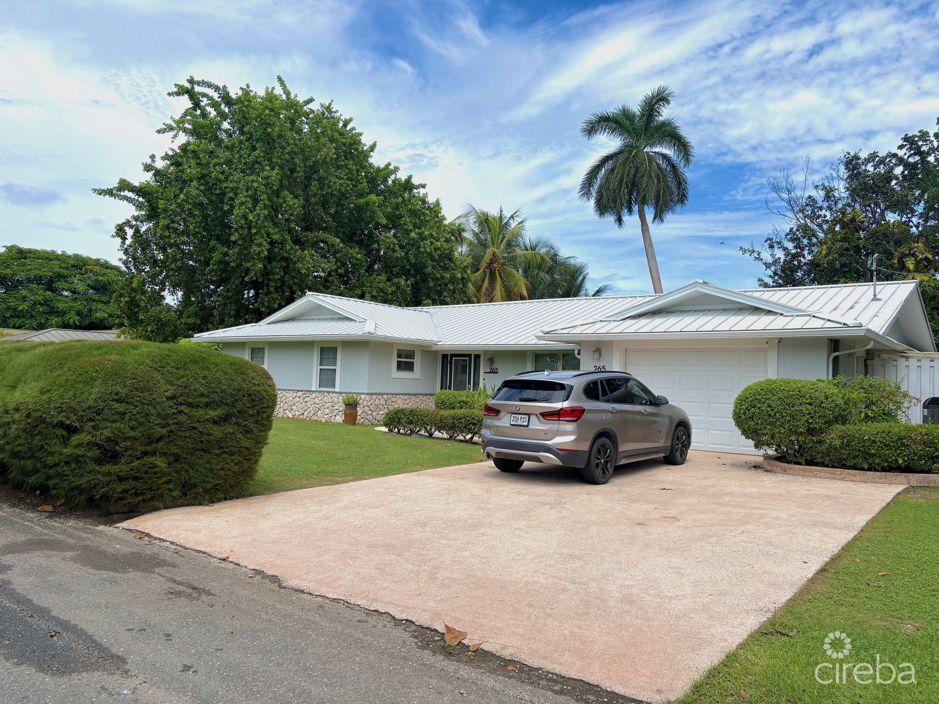 RARE DOUBLE-LOT OASIS BUNGALOW WITH POOL IN SNUG HARBOUR