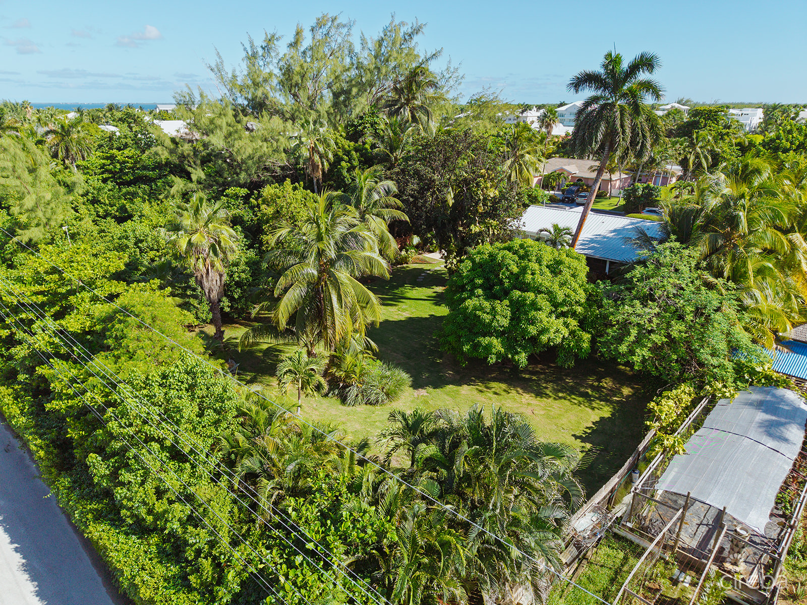 RARE DOUBLE-LOT OASIS BUNGALOW  WITH POOL IN SNUG HARBOUR