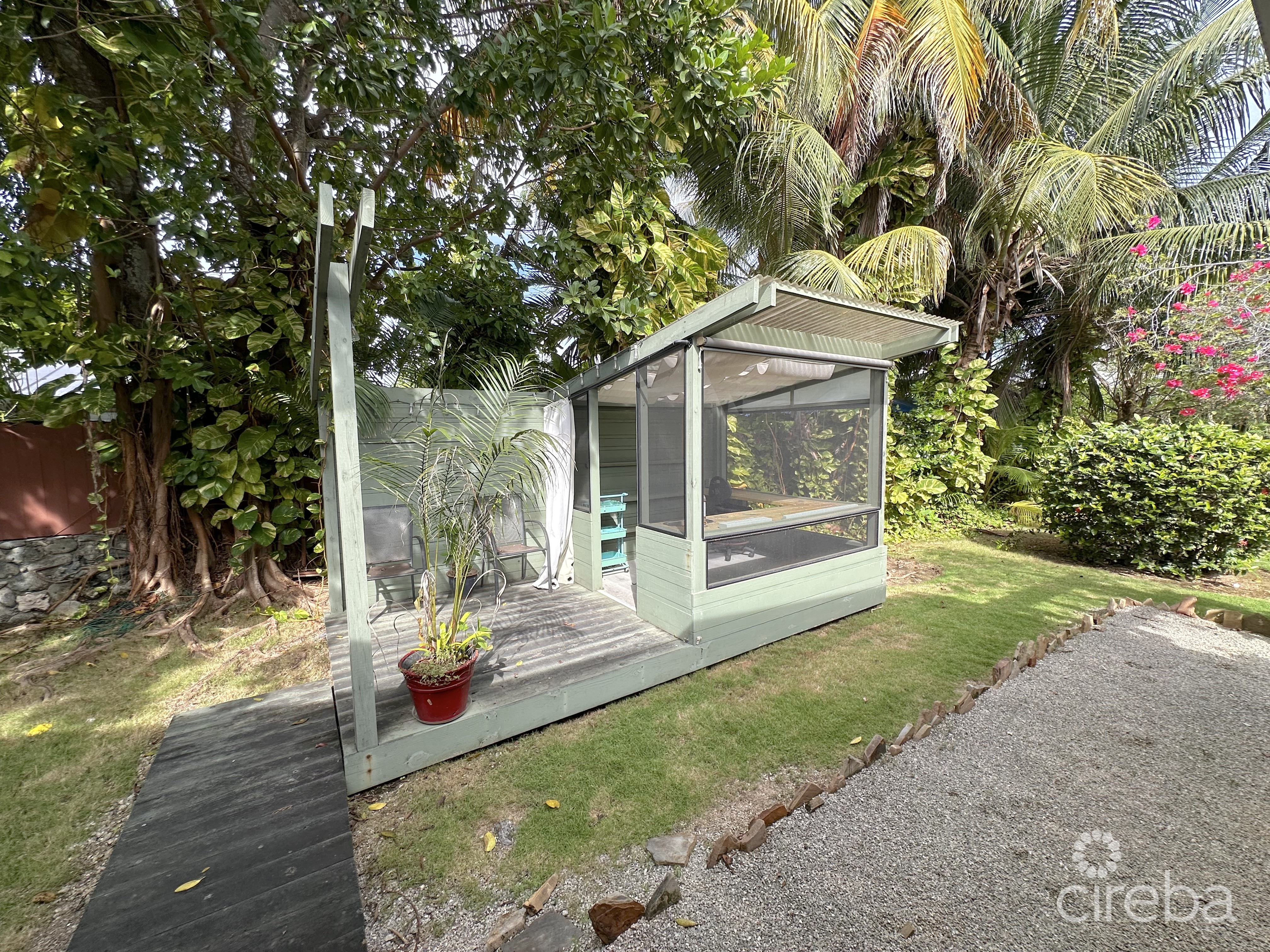 RARE DOUBLE-LOT OASIS BUNGALOW  WITH POOL IN SNUG HARBOUR
