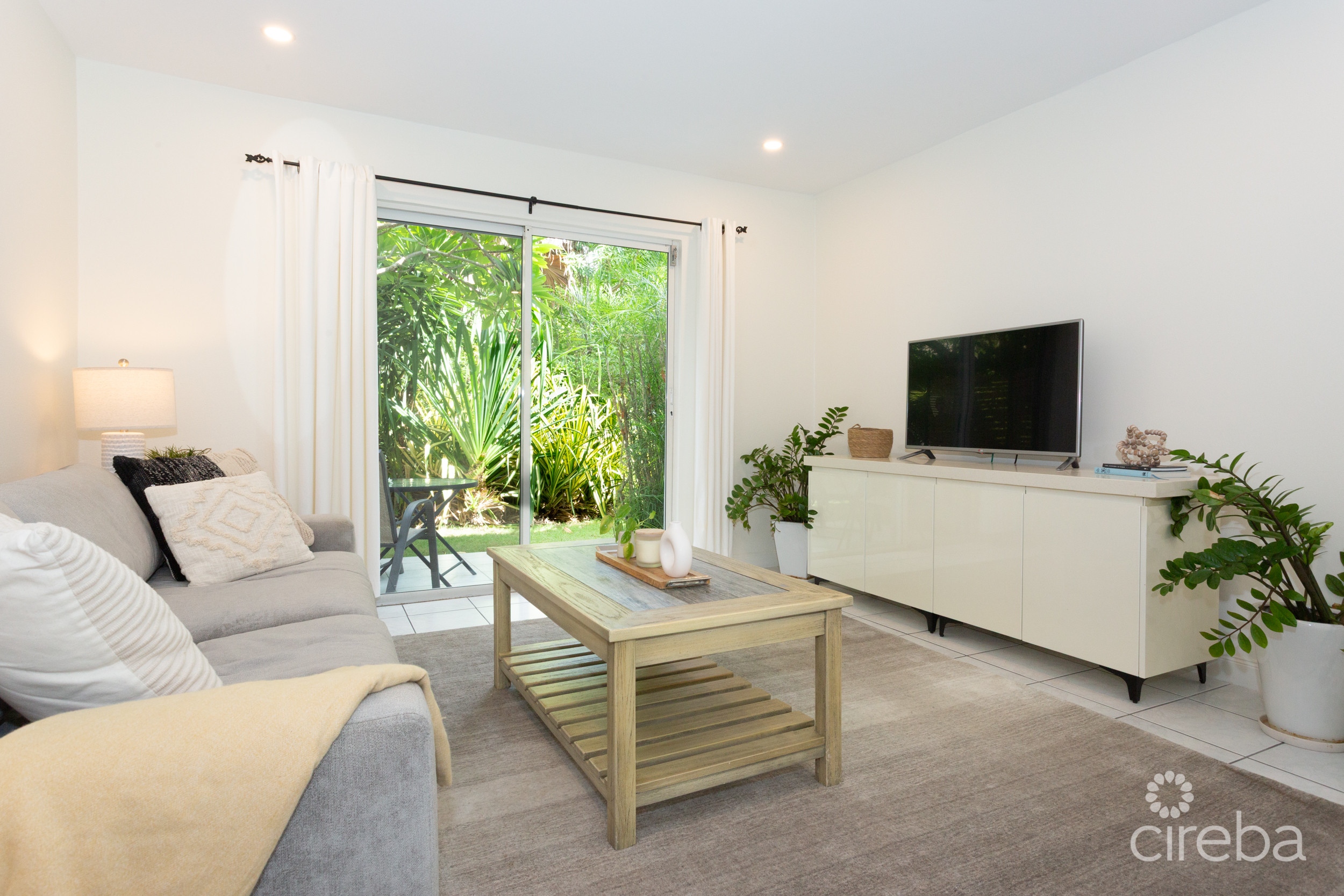 TURNKEY 2BED PLUS DEN END UNIT TROPICAL HAVEN