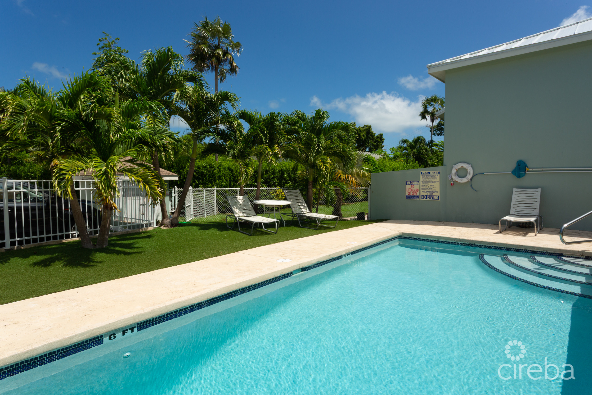 TURNKEY 2BED PLUS DEN END UNIT TROPICAL HAVEN