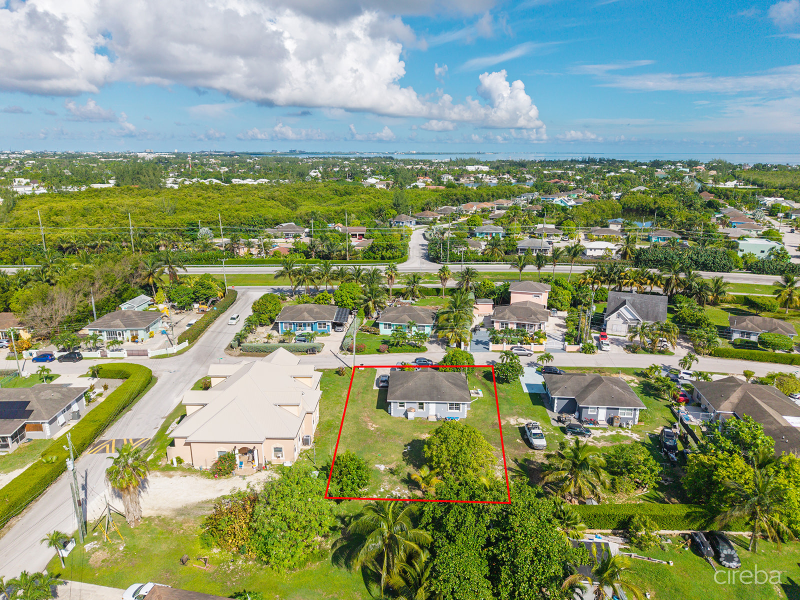 3 BEDROOM HOME ON DUPLEX LOT W/APPROVED PLANS FOR  ADDITIONAL 4-BEDROOM HOME