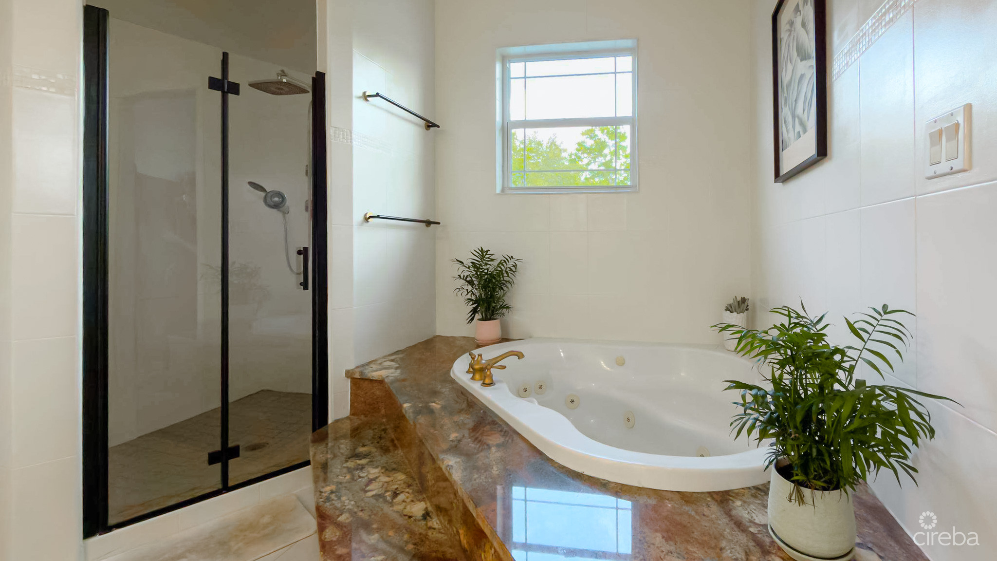 SUN ROSE CANAL FRONT HOME – NORTH SOUND ESTATES
