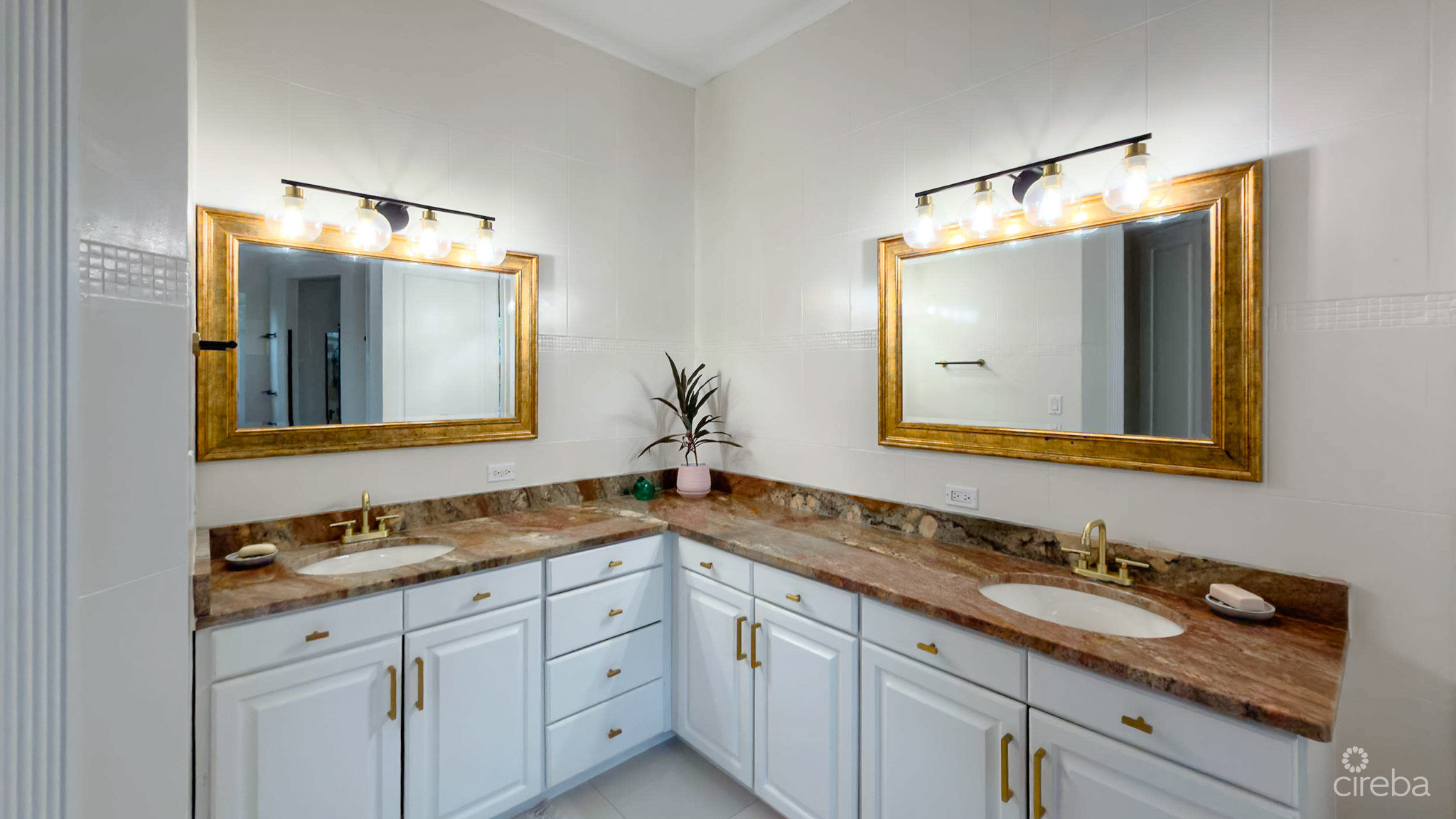 SUN ROSE CANAL FRONT HOME – NORTH SOUND ESTATES