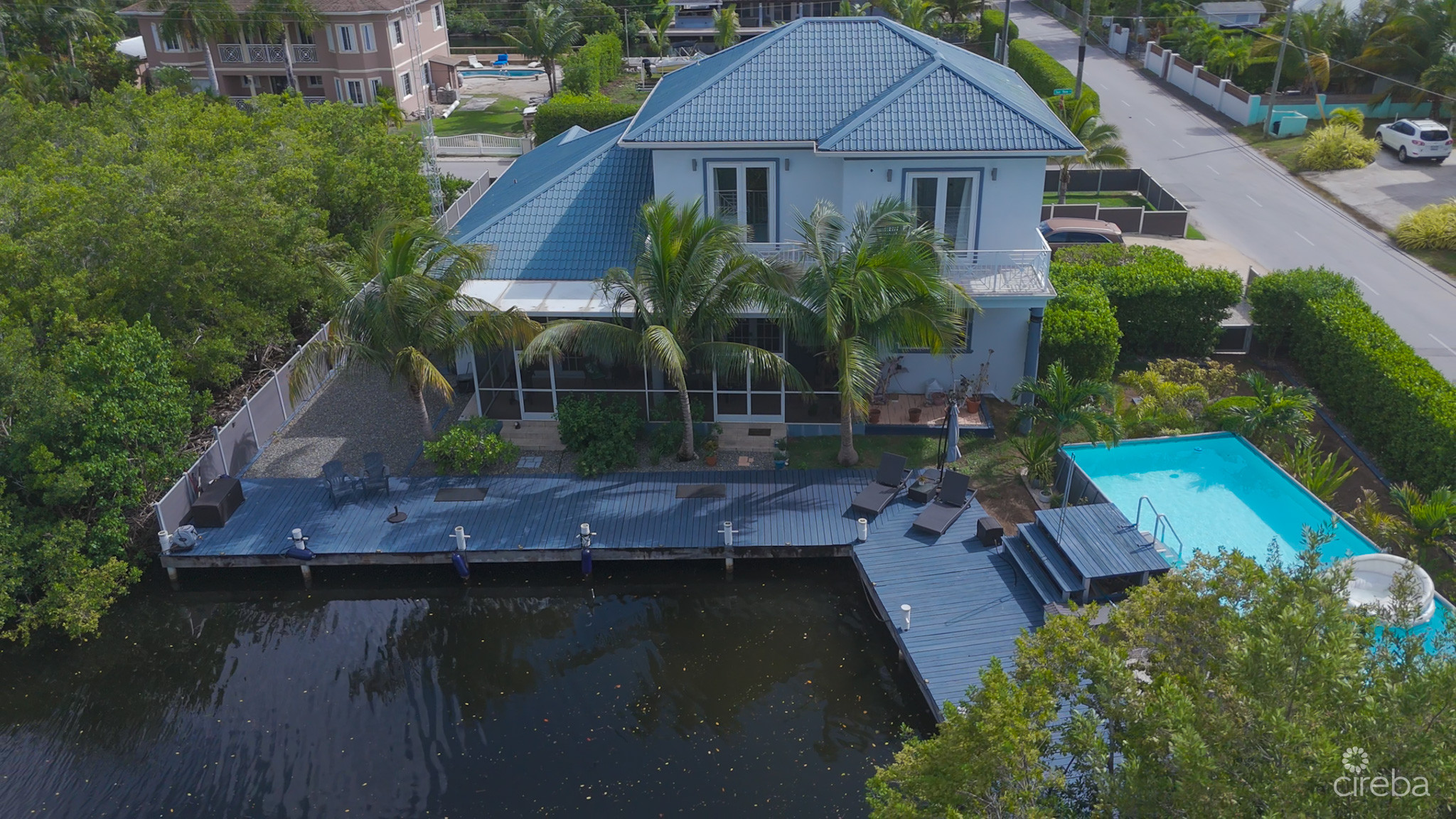 SUN ROSE CANAL FRONT HOME – NORTH SOUND ESTATES