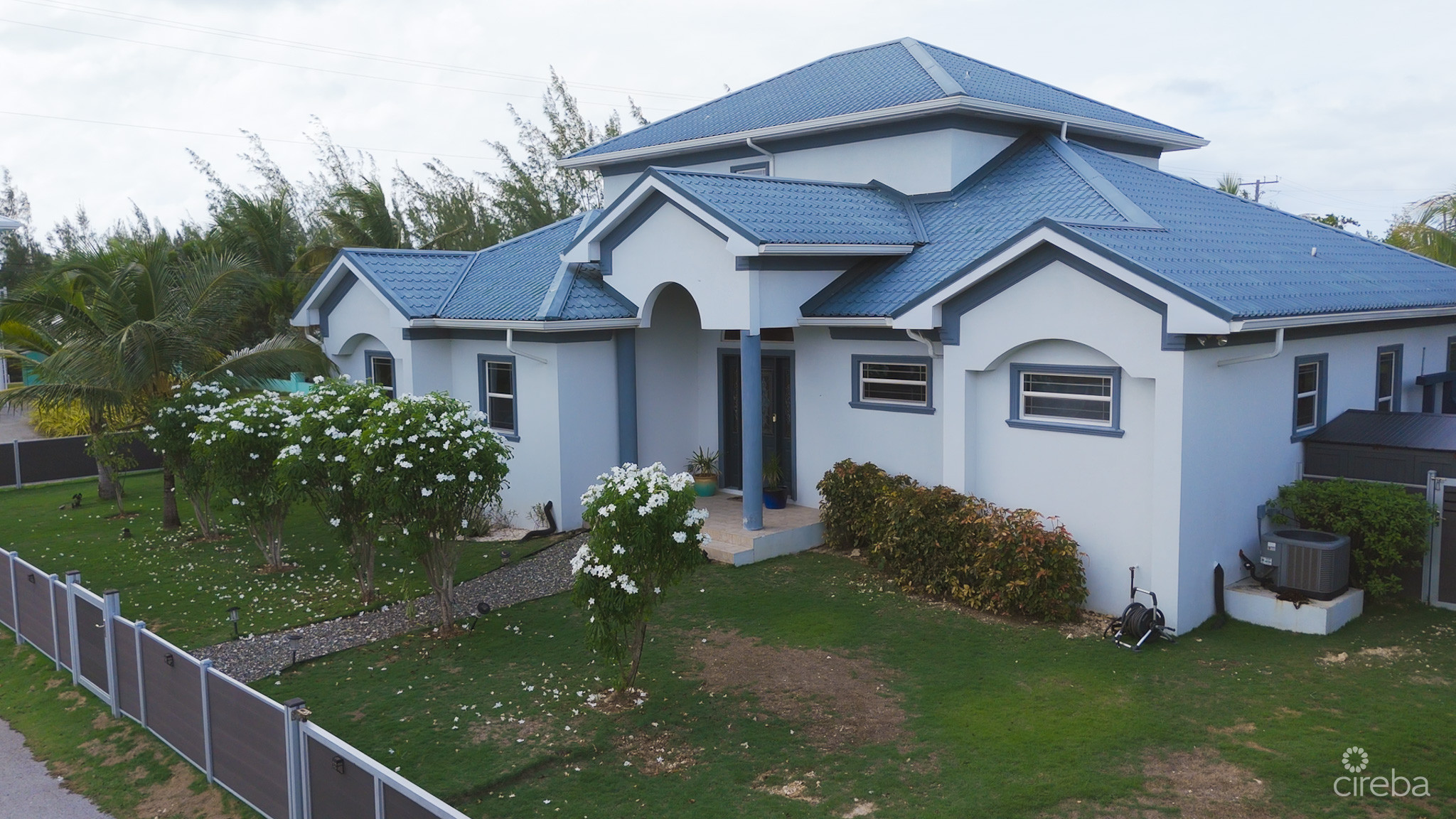 SUN ROSE CANAL FRONT HOME – NORTH SOUND ESTATES