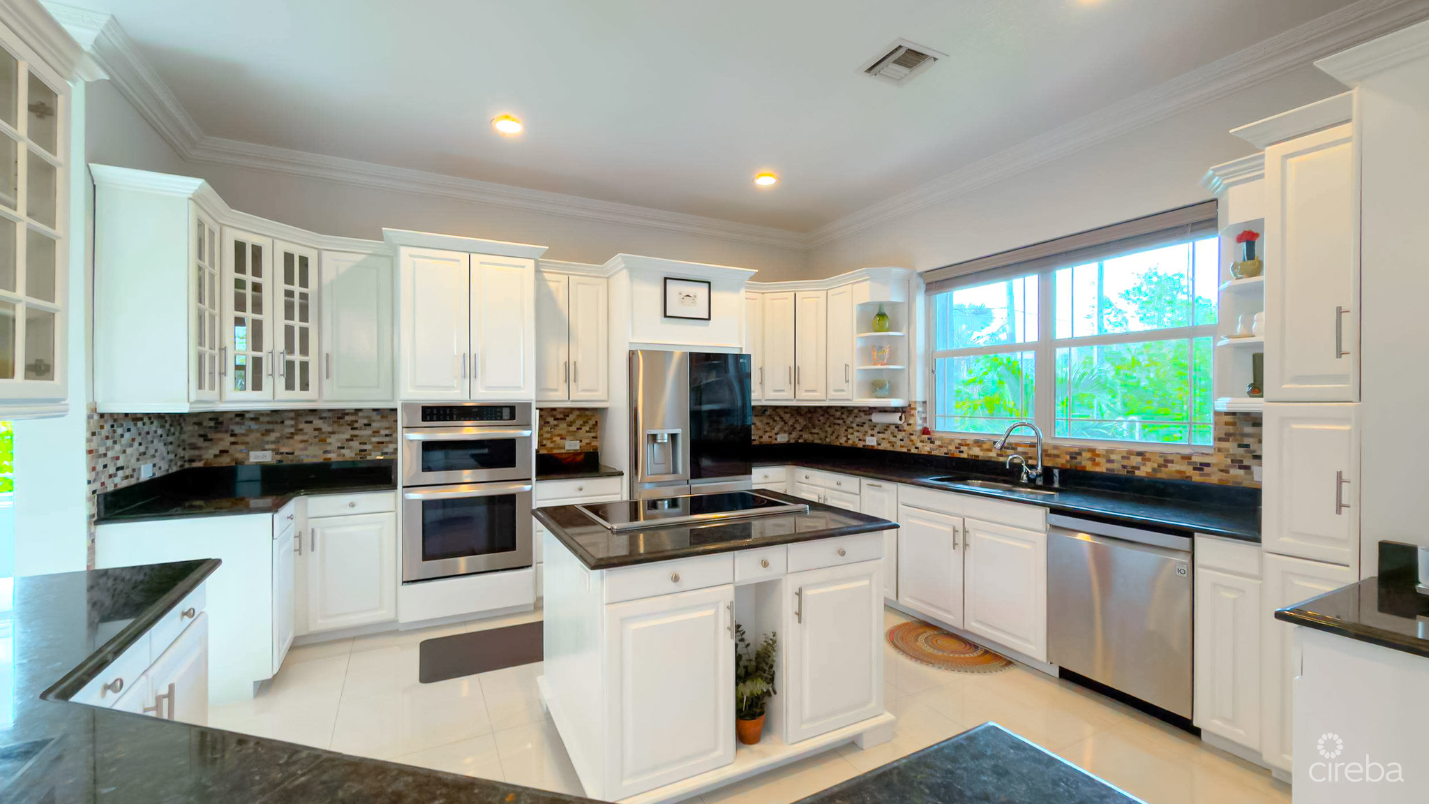 SUN ROSE CANAL FRONT HOME – NORTH SOUND ESTATES