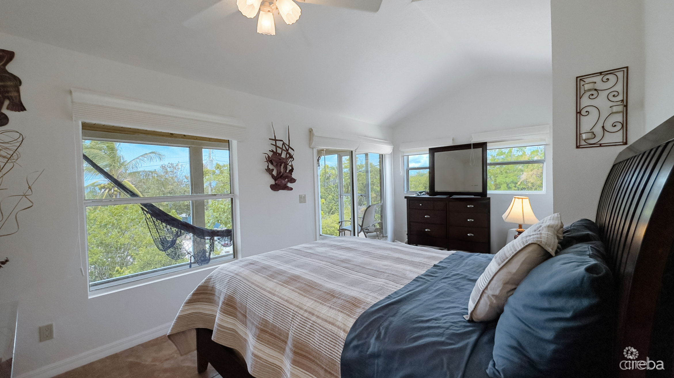 LITTLE CAYMAN OCEAN VIEW RESIDENTIAL HOME W/ BEACHFRONT LOT JUST SHY OF 1 ACRE