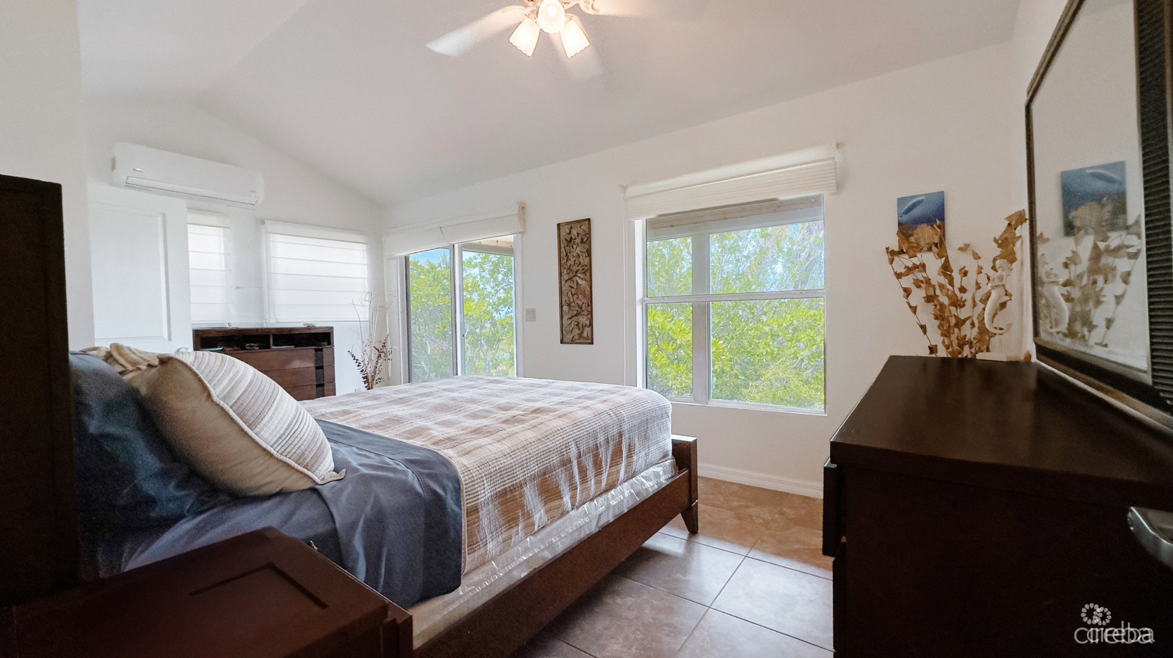 LITTLE CAYMAN OCEAN VIEW RESIDENTIAL HOME W/ BEACHFRONT LOT JUST SHY OF 1 ACRE