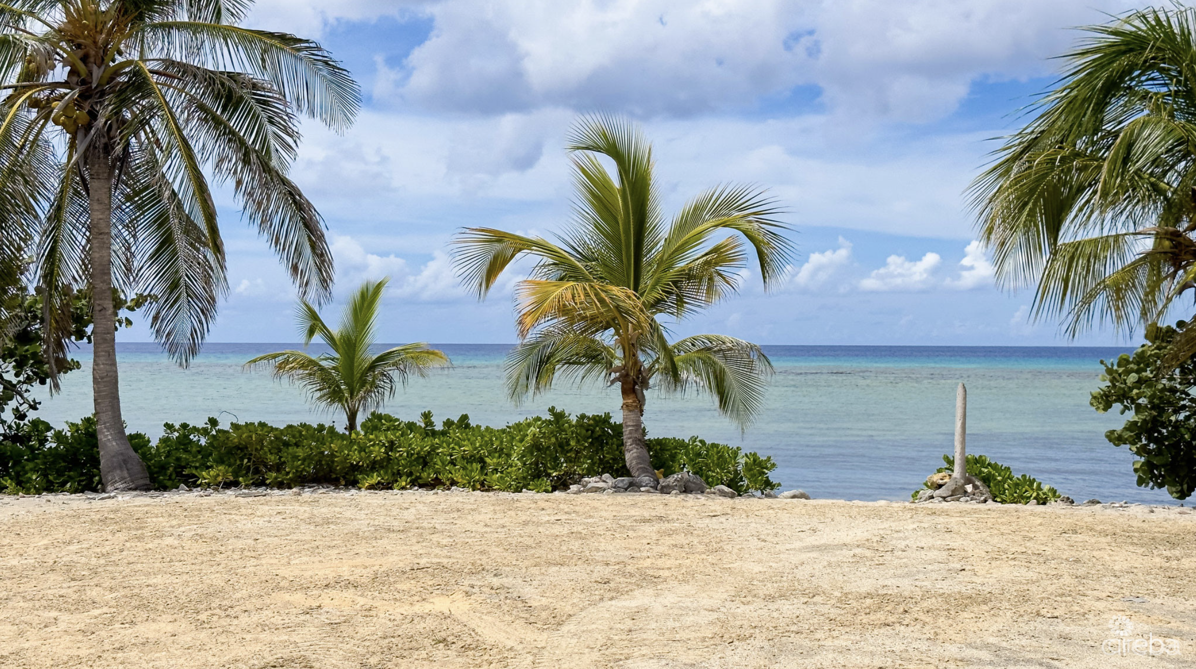 LITTLE CAYMAN OCEAN VIEW RESIDENTIAL HOME W/ BEACHFRONT LOT JUST SHY OF 1 ACRE
